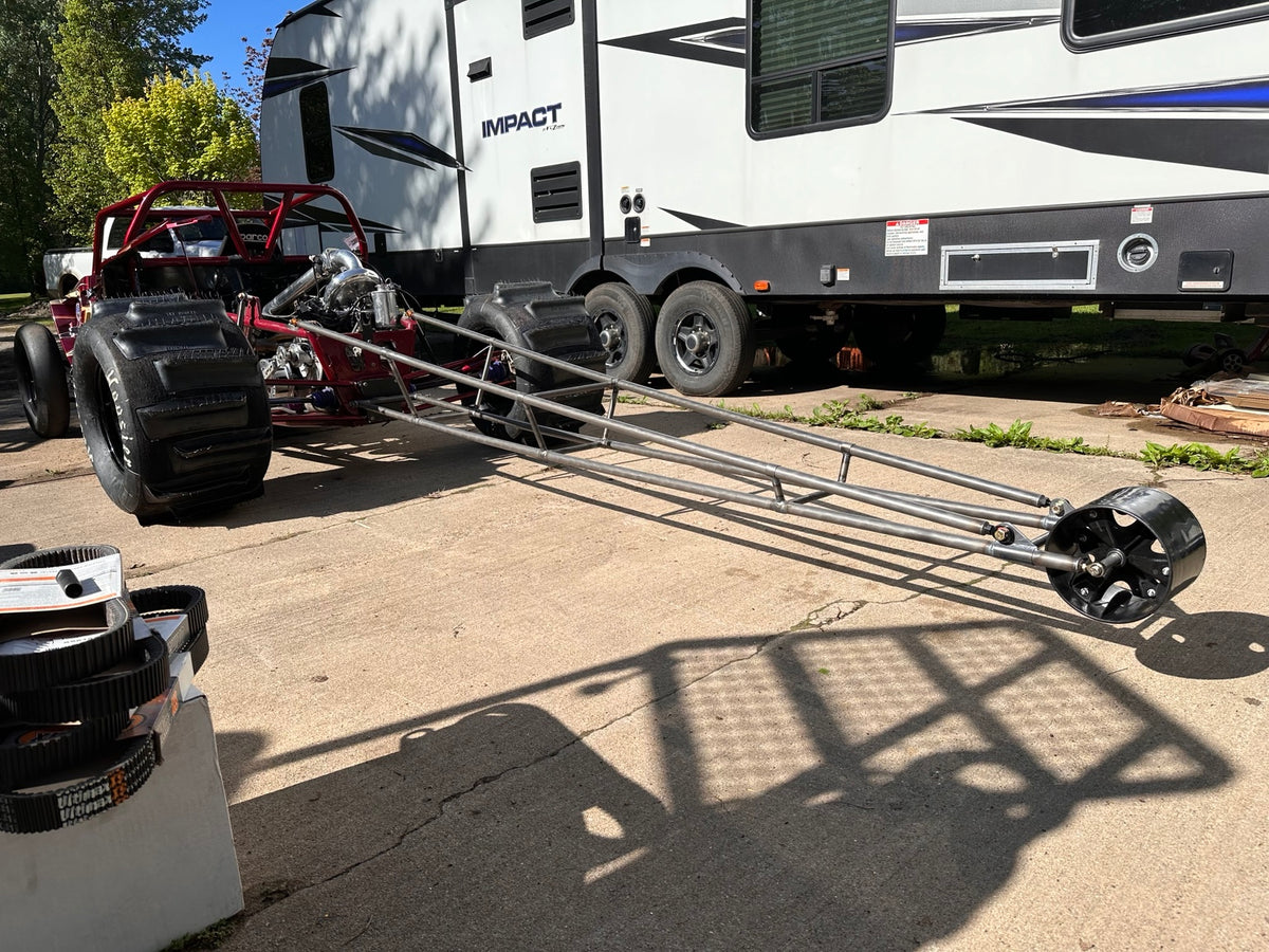 Custom race vehicle with fabricated wheelie bars