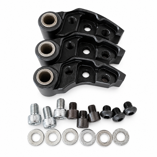 Three black adjustable clutch weights with tuning hardware on a white background